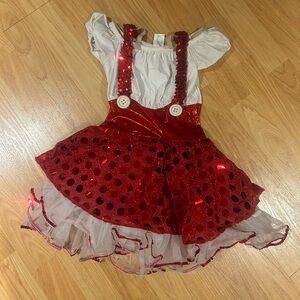 a wish come true red and white dance costume with tutu and suspenders